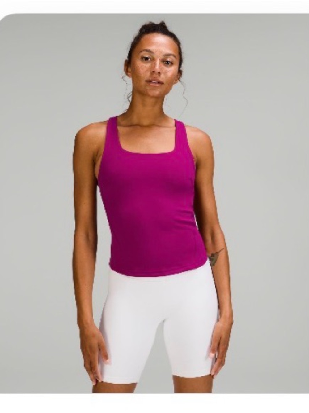 Instill Tank Top. Magenta Purple. Size 10. Does not come with removable pads.